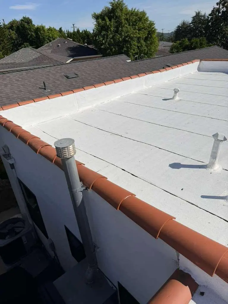 Reflective Flat Roof System — Pinnacle Roofing Systems project photo