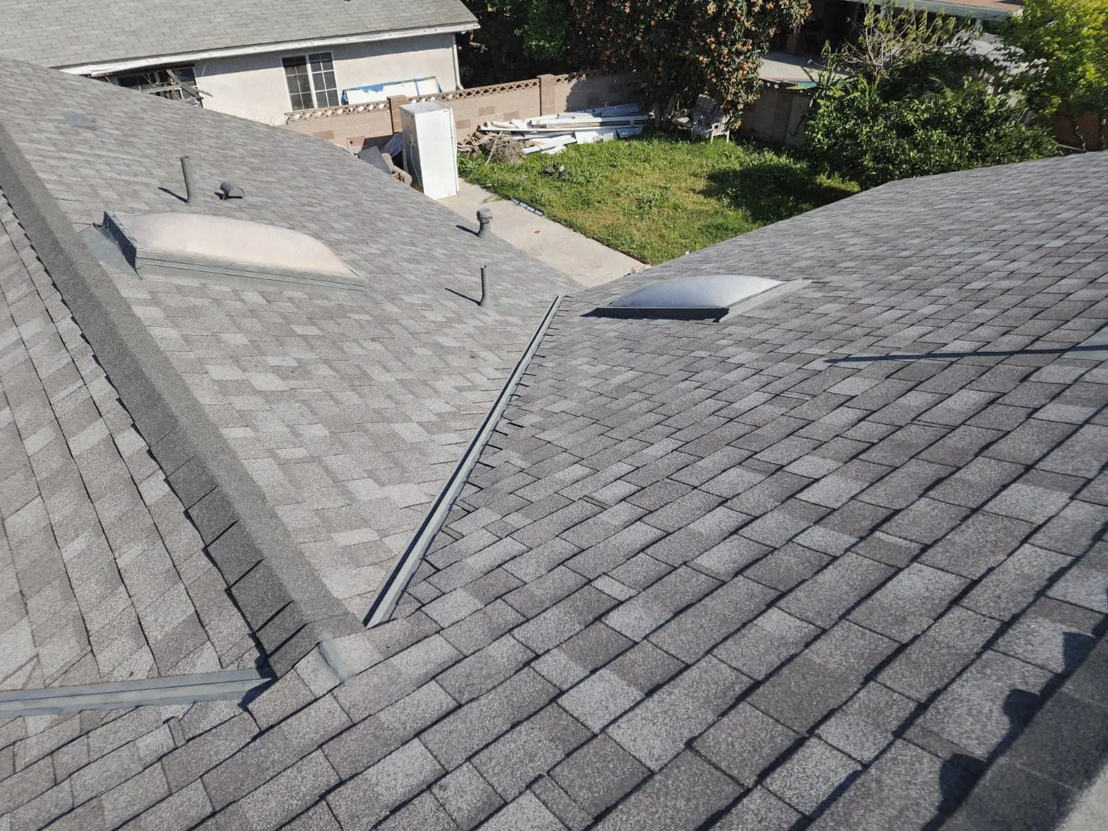 Shingle and Skylight Work — Pinnacle Roofing Systems project photo